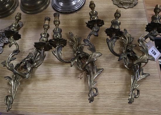 Three rococo style wall lights and a candelabra wall lights height 38cm